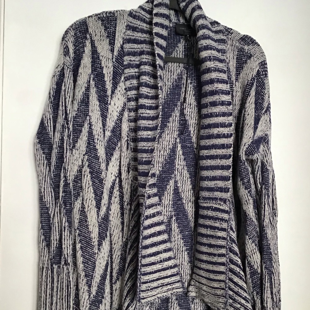 Romeo and Juliet Couture off white and navy cardigan. Stylish and perfect fit.